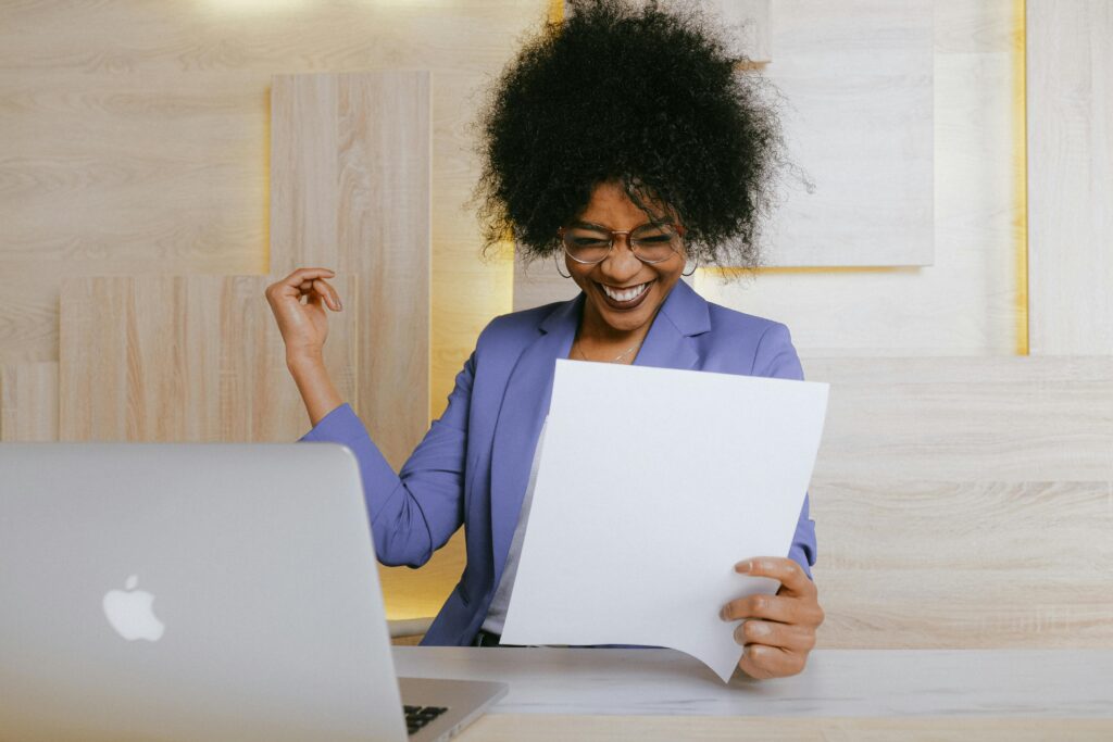 Woman holding a paper